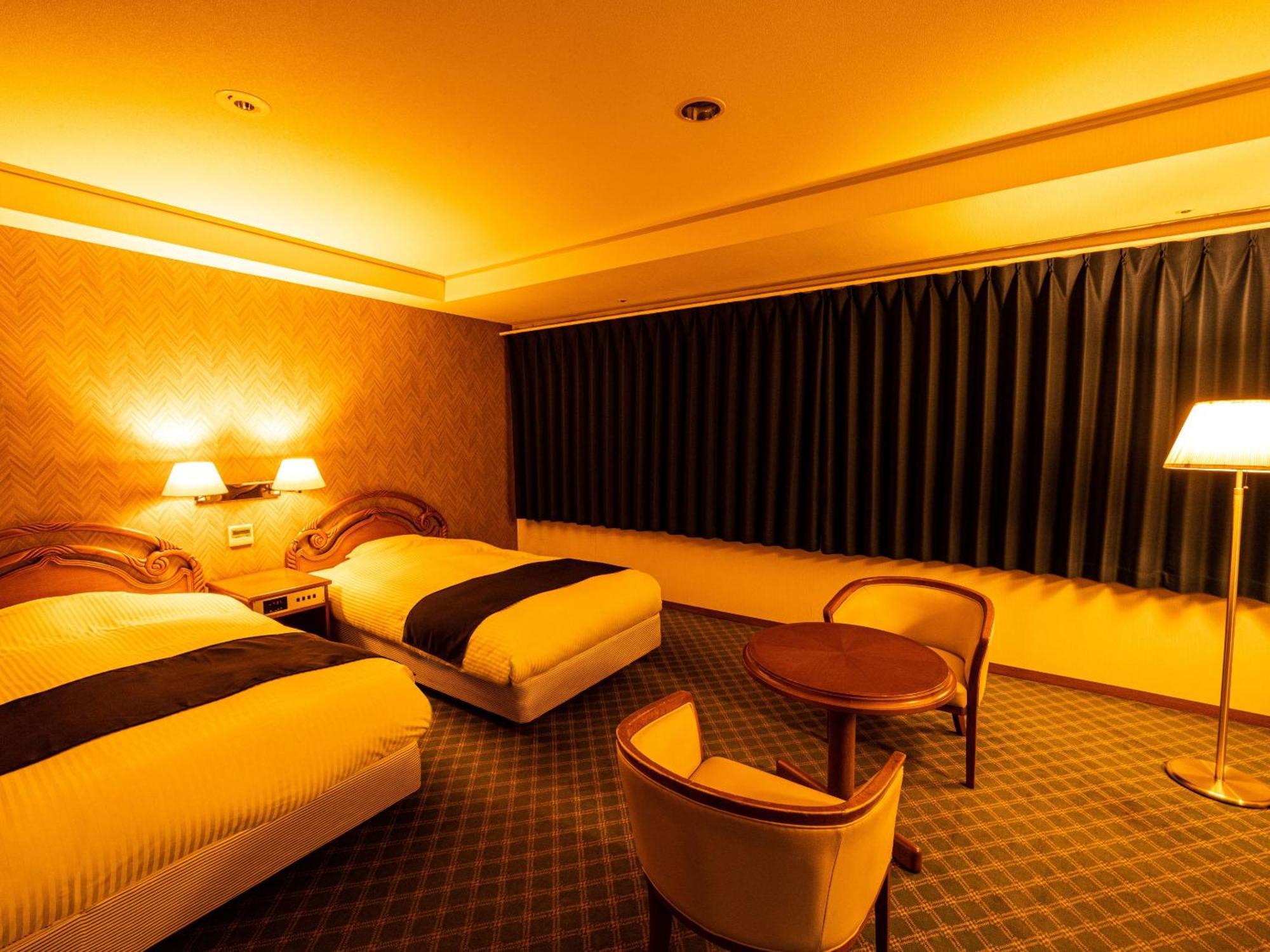 Ooedo Onsen Monogatari Premium Hotel Fugetsu Beppu Quarto foto