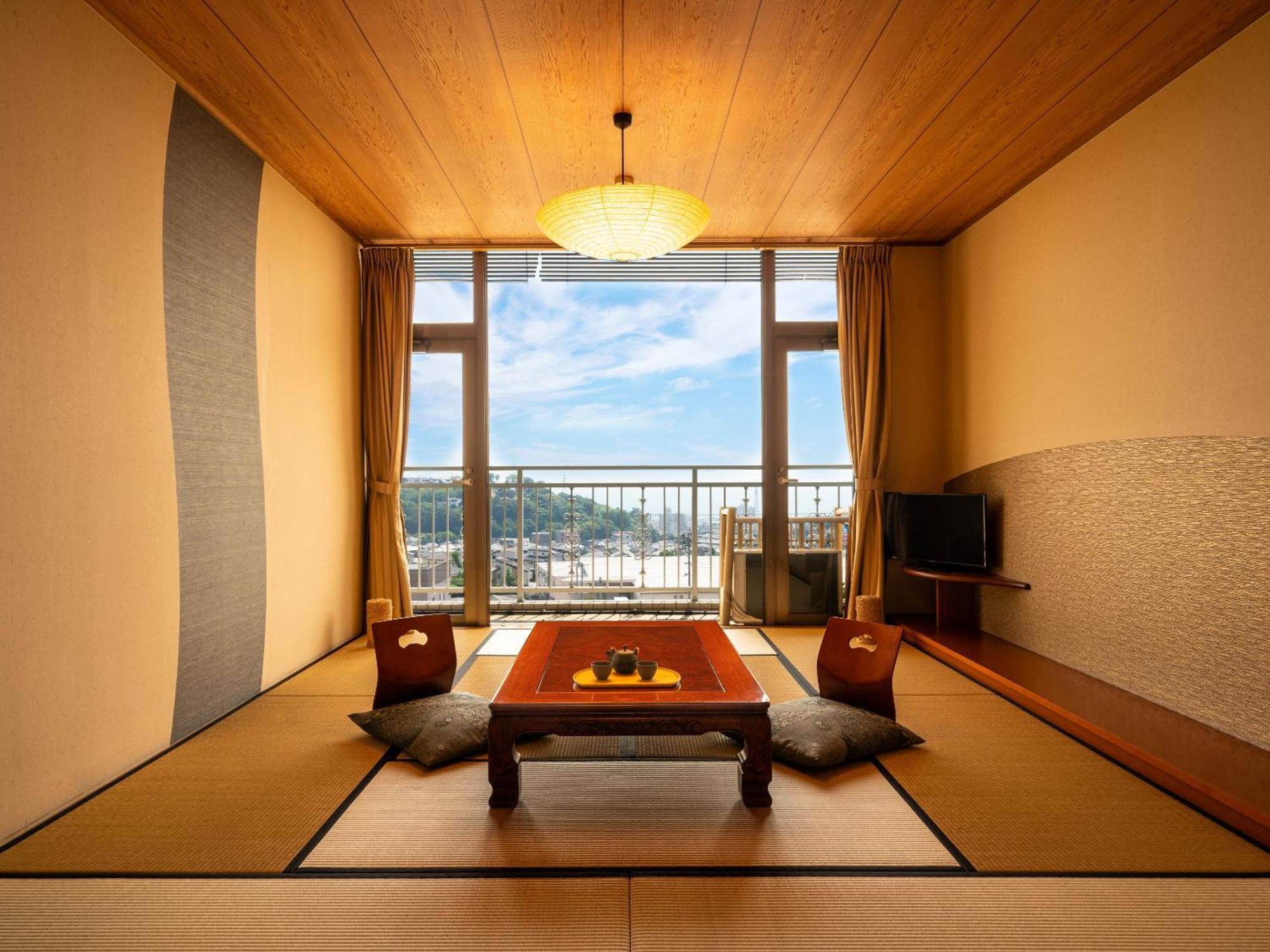 Ooedo Onsen Monogatari Premium Hotel Fugetsu Beppu Quarto foto